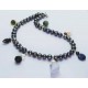 Necklace with gray freshwater pearls and semi-precious stones charms