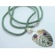 Green sage silk necklace with carved Tahiti mother of pearl leaf pendant with amethyst cabochon and baroque pearl