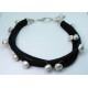 Multistrand black velvet necklace with white baroque pearls